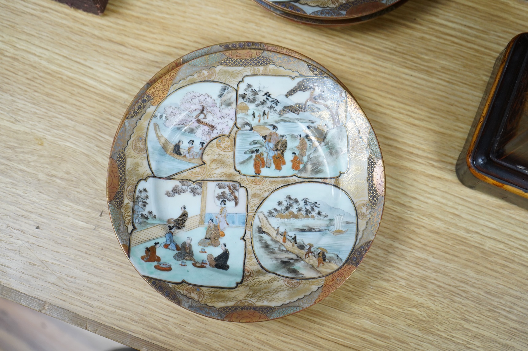 A set of nine early 20th century Japanese Kutani plates, largest 21.5cm